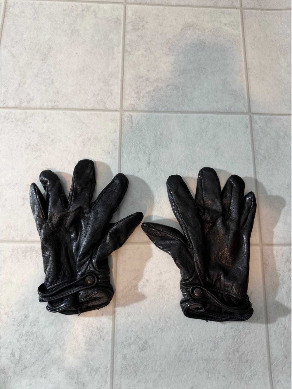 Black leather gloves